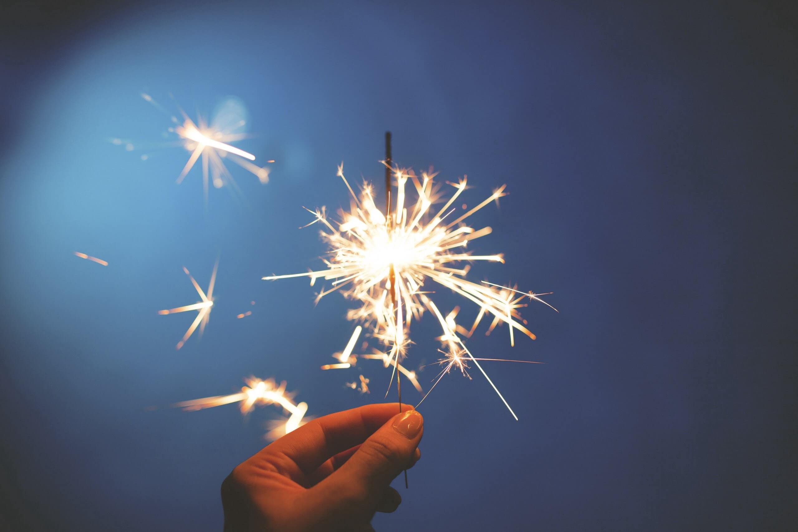 Holding a small fireworks on a hand